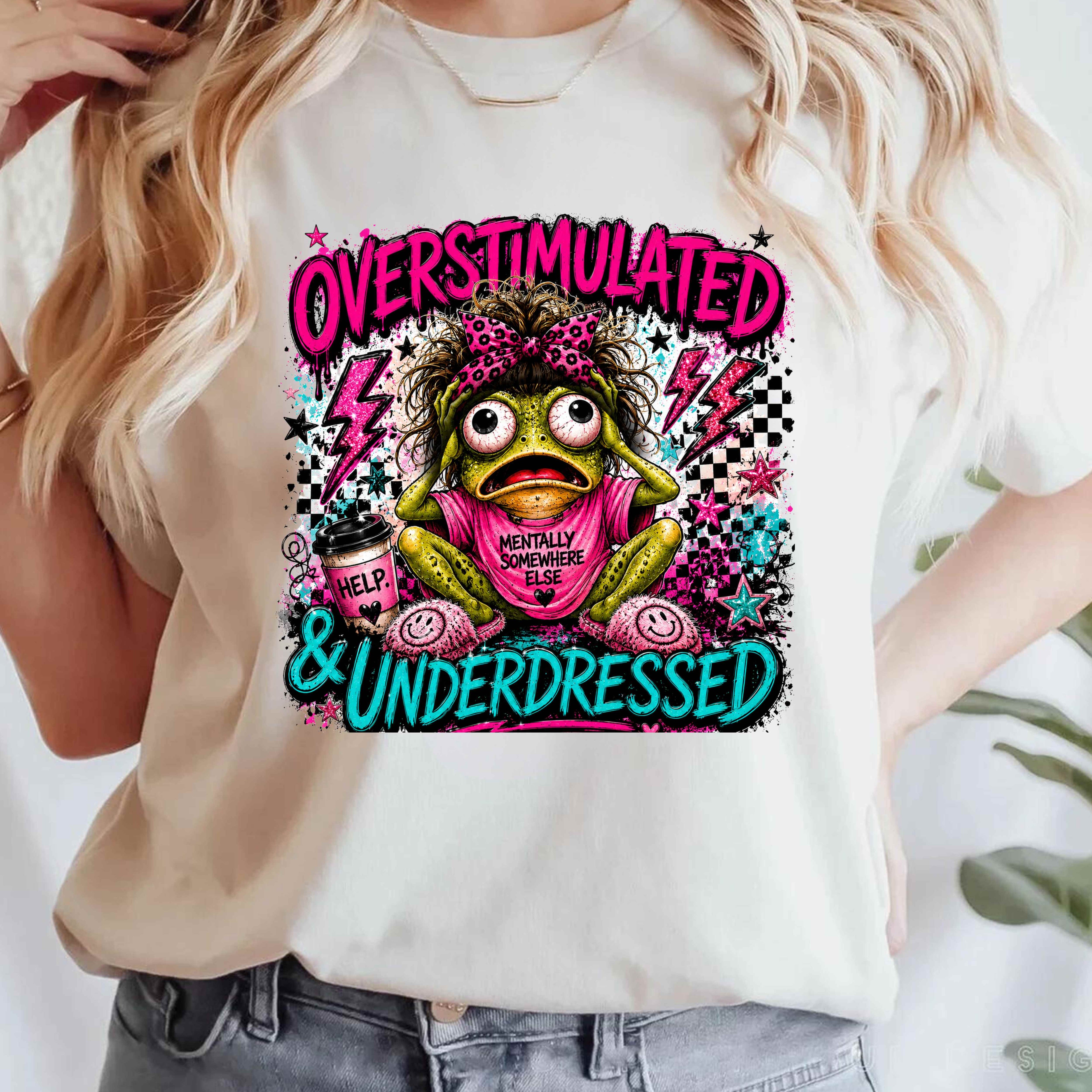 Bright neon comic-style frog design featuring a frazzled frog with bold “Overstimulated & Underdressed” lettering, playful grunge details, and vibrant pink and teal colors.