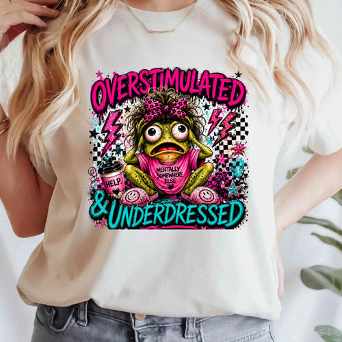 Bright neon comic-style frog design featuring a frazzled frog with bold “Overstimulated & Underdressed” lettering, playful grunge details, and vibrant pink and teal colors.